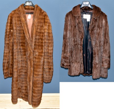 Lot 869 - A short brown vintage mink fur coat, labelled...