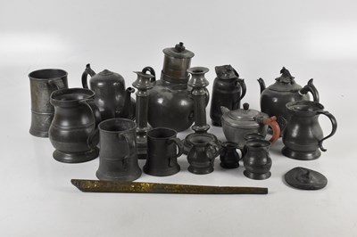 Lot 778 - A collection of pewter including teapots,...