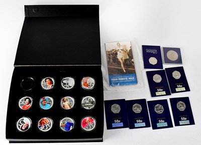 Lot 558 - A collection of commemorative 50p coins, to...