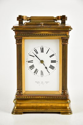 Lot 1216 - GOLDSMITHS CO; a brass cased carriage clock...