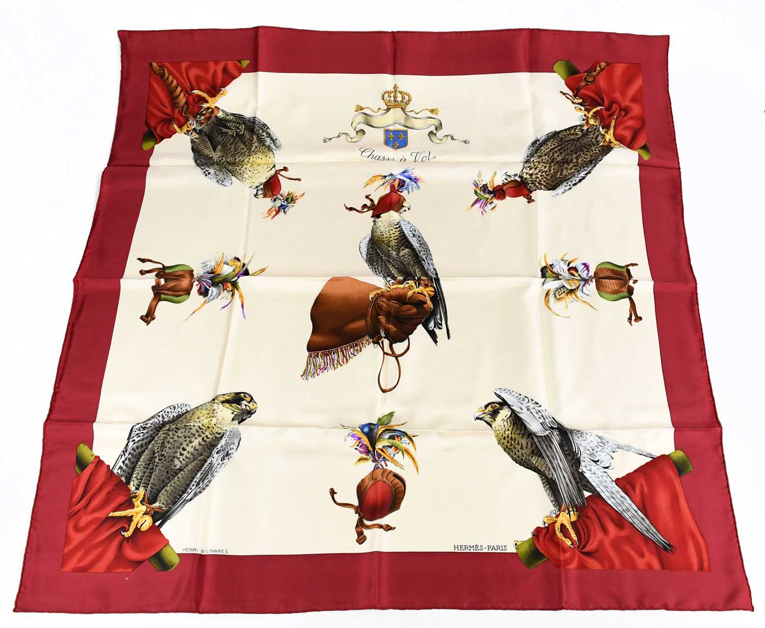Lot 763 - HERMÈS; a 100% silk red, brown and blue...
