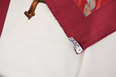 Lot 763 - HERMÈS; a 100% silk red, brown and blue...
