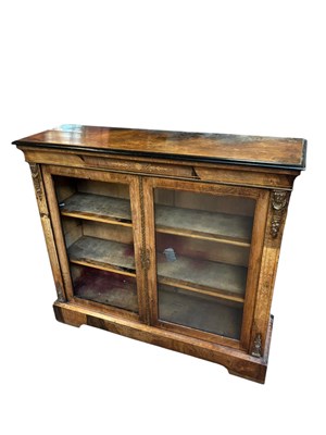 Lot 170 - A Victorian walnut and ebonised display...