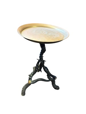 Lot 295 - A Victorian antler table with brass top and...