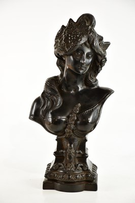 Lot 701 - An Art Nouveau style bronze bust of a maiden...