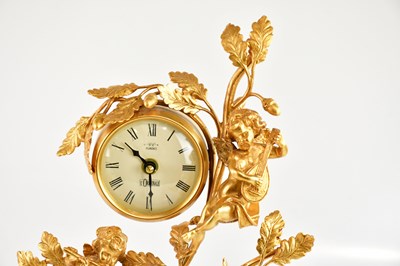 Lot 1242 - L'ORIGINALE; a reproduction gilt metal and...