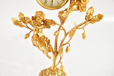 Lot 1242 - L'ORIGINALE; a reproduction gilt metal and...