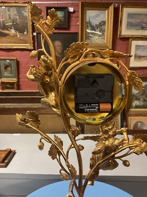 Lot 1242 - L'ORIGINALE; a reproduction gilt metal and...