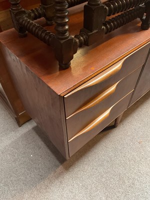 Lot 4 - A mid century teak dining suite comprising...