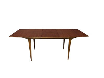 Lot 4 - A mid century teak dining suite comprising...