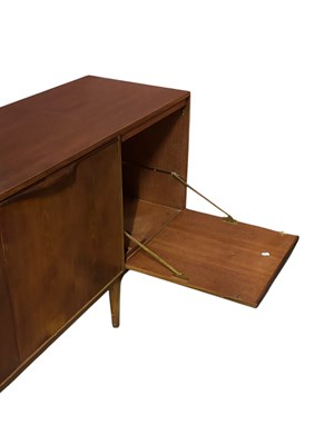 Lot 4 - A mid century teak dining suite comprising...