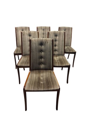 Lot 4 - A mid century teak dining suite comprising...