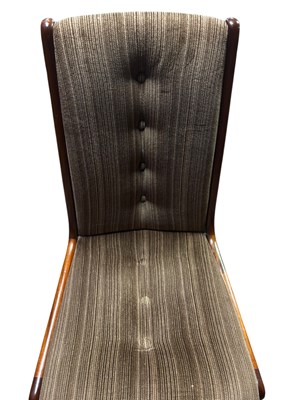 Lot 4 - A mid century teak dining suite comprising...