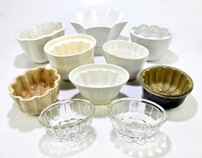 Lot 581 - A collection of ten assorted jelly moulds to...