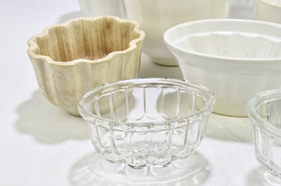 Lot 581 - A collection of ten assorted jelly moulds to...