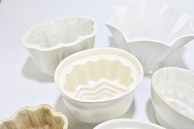 Lot 581 - A collection of ten assorted jelly moulds to...