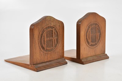 Lot 532 - A pair of early 20th century walnut book ends...