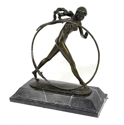 Lot 307 - A reproduction bronzed metal figure, 'The Hoop...