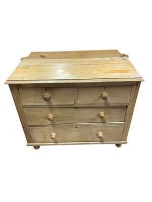 Lot 121 - A pine chest of two short over two long...