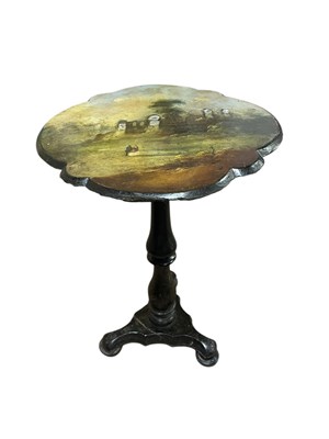 Lot 241 - A Victorian papier mache circular top table...