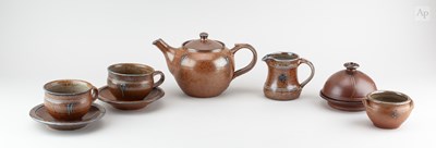 Lot 675 - TOFF MILWAY (born 1949); a salt glazed tea set...