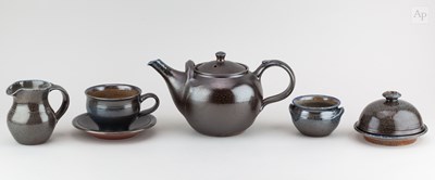 Lot 674 - TOFF MILWAY (born 1949); a salt glazed tea set...