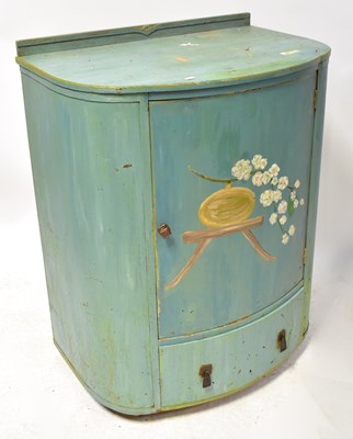 Lot 85 - A 1930s bow-fronted cupboard painted green,...