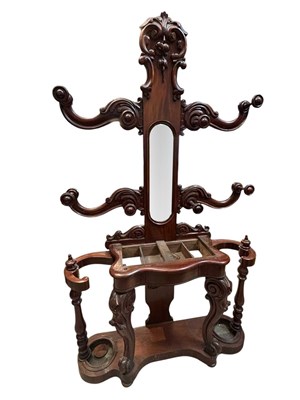 Lot 242 - A Victorian mahogany hall stand with carved...