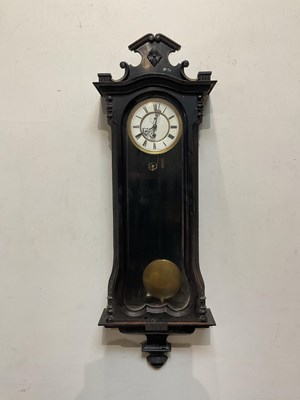 Lot 1262 - A 19th century ebonised Vienna wall clock,...