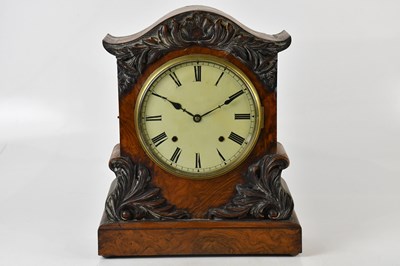 Lot 1228 - A William IV carved walnut bracket clock, the...