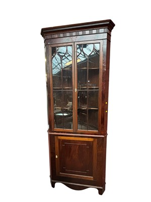 Lot 97 - A Georgian mahogany freestanding corner...