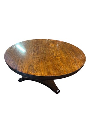 Lot 168 - A 19th century rosewood tilt-top breakfast...