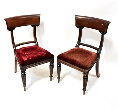 Lot 48 - Seven George III mahogany bar-back dining...