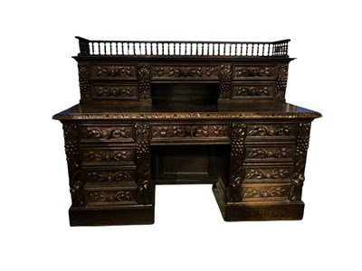 Lot 154 - A late 19th century Flemish style carved oak...