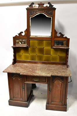 Lot 75 - An Edwardian mahogany marble-topped washstand,...