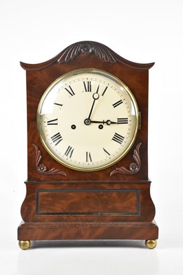 Lot 1229 - A William IV carved mahogany bracket clock,...