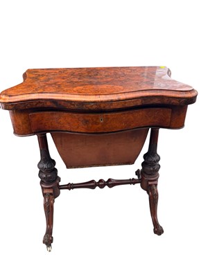 Lot 224 - A Victorian walnut serpentine front foldover...