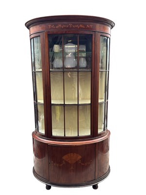 Lot 194 - An Edwardian inlaid mahogany bowfront display...