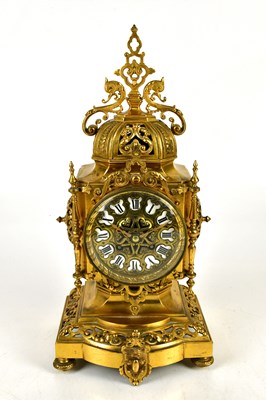 Lot 1230 - A reproduction French style gilt brass clock...