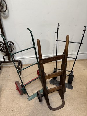 Lot 402 - Two antique painted sack trucks and a wooden...