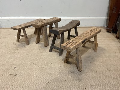 Lot 111 - Four vintage rustic stools, length of largest...