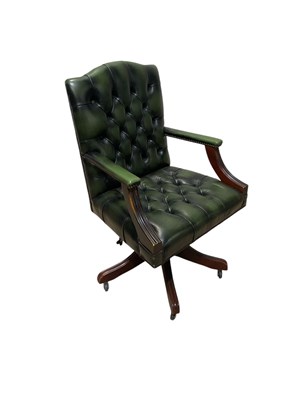 Lot 55 - A modern green leather Chesterfield type...