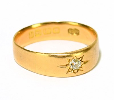 Lot 1114 - An 18ct yellow gold diamond set ring, gross...