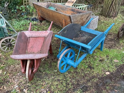 Lot 349 - A vintage wooden blue painted wheel barrow...