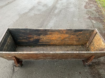 Lot 353 - A large 19th century dough trough on...