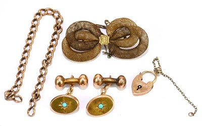 Lot 1288 - A yellow metal curb link broken bracelet,...