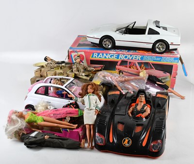 Lot 1167 - A collection of Action Man and Barbie figures,...