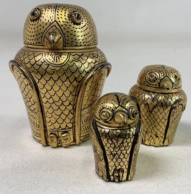 Lot 43 - A set of three gilt and black lacquer...