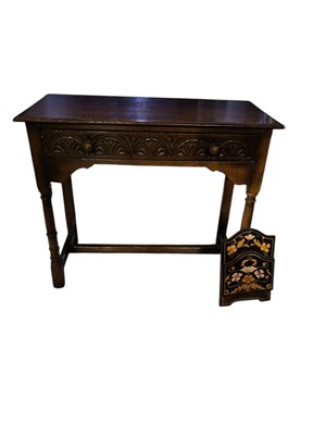 Lot 77 - A reproduction oak side table with single...