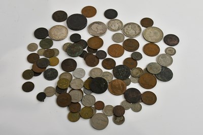 Lot 646 - A small collection of assorted coins including...